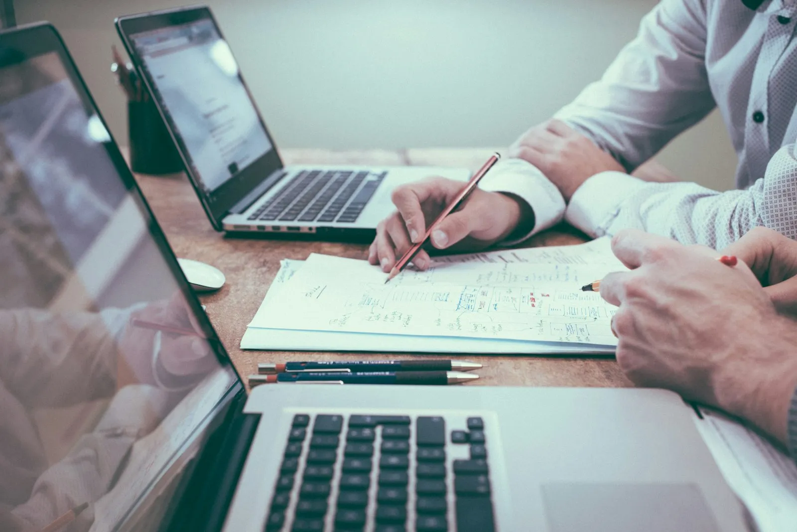Business advisors meeting a client